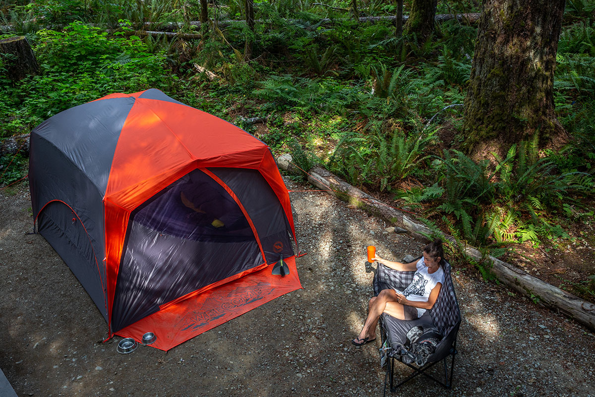 ​​Big Agnes Big House 6 camping tent (sitting in chair at camp)